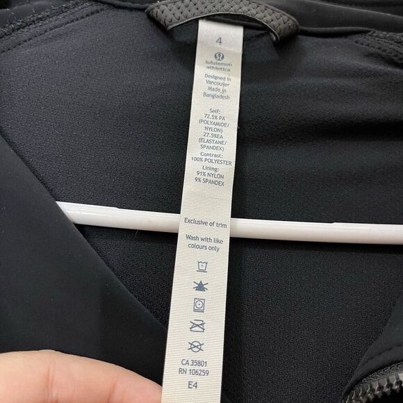 Lululemon Bust A Move Jacket Women’s Size 4 Black Hooded Peplum Reflective Zip - Picture 12 of 12